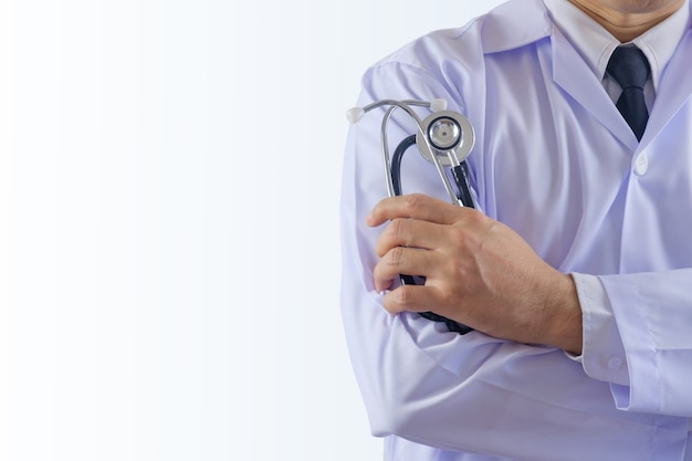 Doctor holds stethoscope.