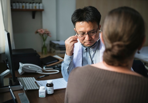 Doctor is checking patient symptom