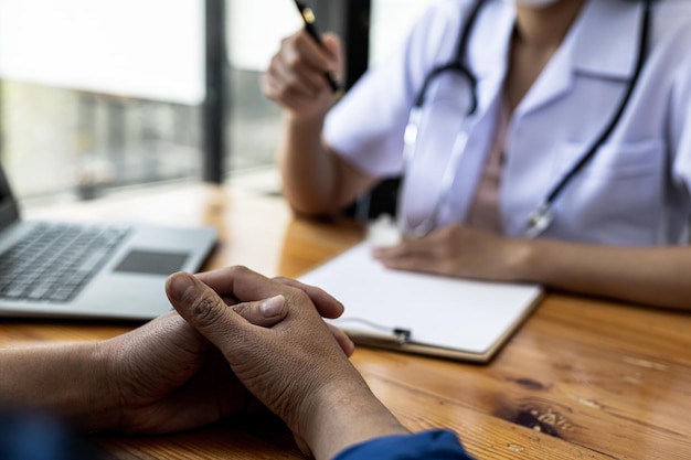 The doctor and the patient are discussing the details of the treatment, the results of the physical examination of the patient. Annual physical examination concept.