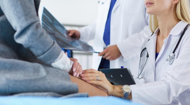 Doctor and patient discussing scan results in diagnostic center