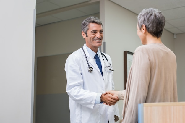 Doctor and patient handshake