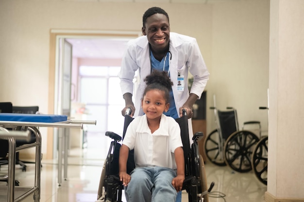 Doctor playing with his patient in hospital Pediatrician and kid