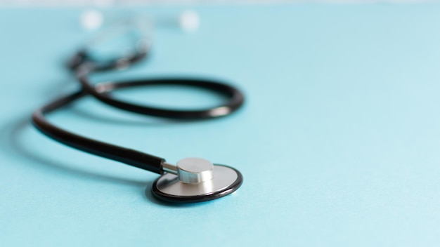 Doctor's stethoscope on blue background