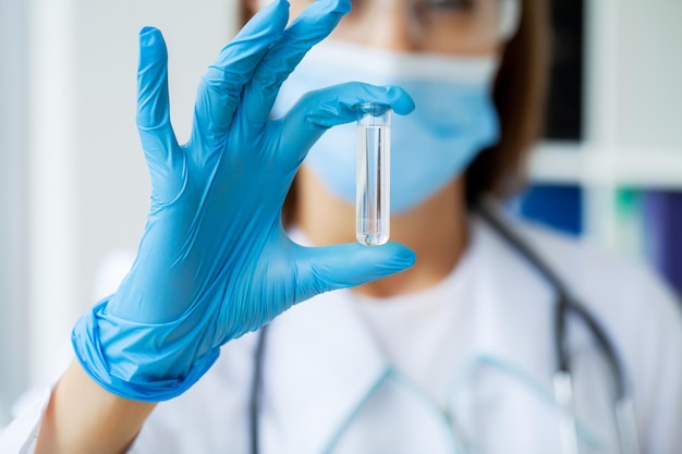 Doctor scientist in lab doing chemical test