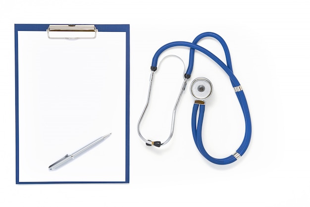 Doctor table with stethoscope, clipboard and pen, top view