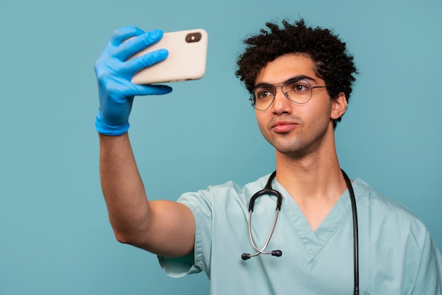 Doctor taking selfie side view