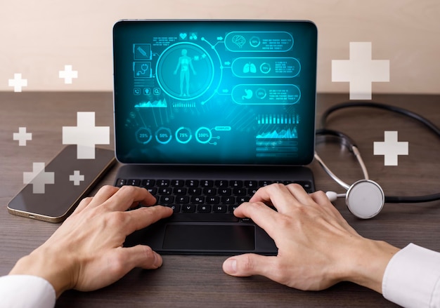 Doctor using laptop with DNA graph and biochemical research scientist working with a microscope human dna detection graph Checking for abnormalities in the bodyscience and experiment