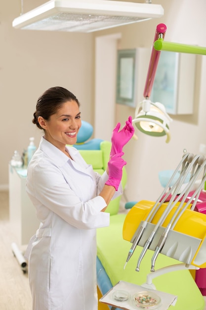 Doctor wearing a lab coat and aseptic gloves