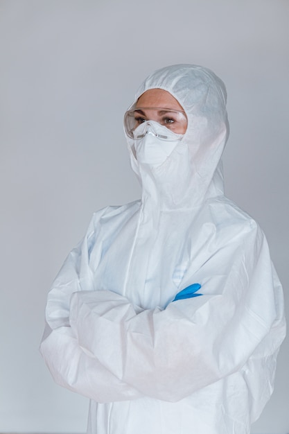 A doctor wearing a protective suit to fight coronavirus pandemic