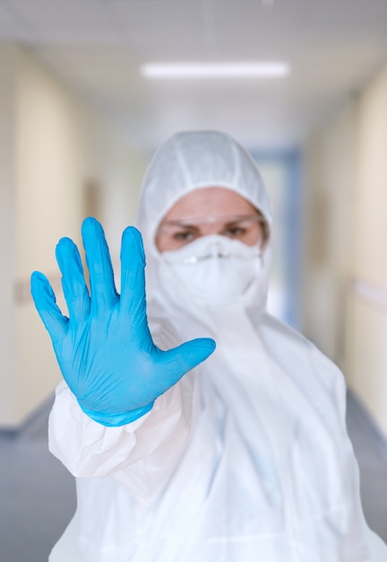 A doctor wearing a protective suit to fight coronavirus pandemic