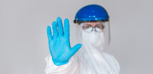 A doctor wearing a protective suit to fight coronavirus pandemic