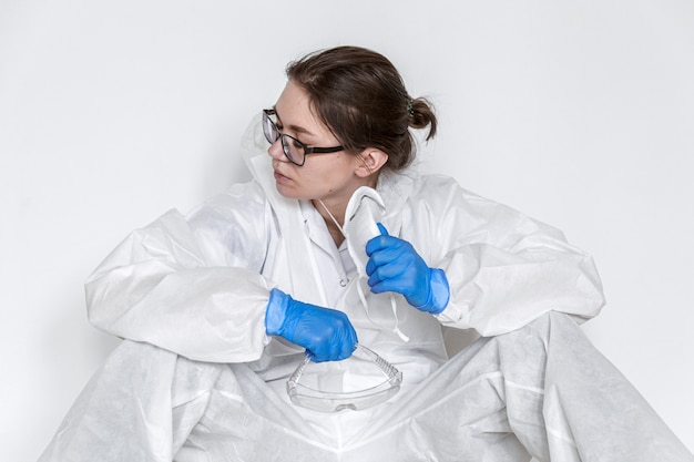 A doctor wearing a protective suit to fight coronavirus pandemic