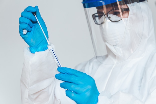 A doctor wearing a protective suit to fight coronavirus pandemic