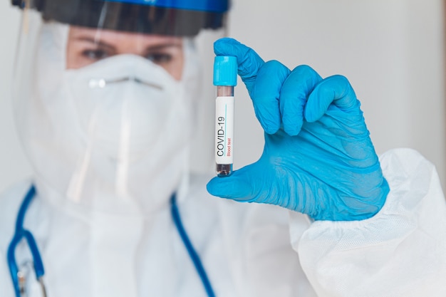 A doctor wearing a protective suit to fight coronavirus pandemic