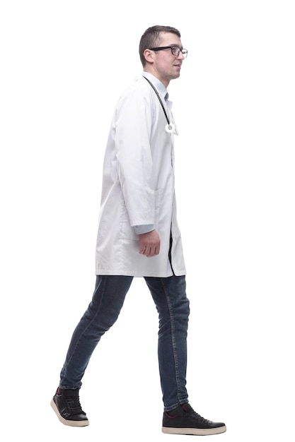 Doctor in a white coat striding forward