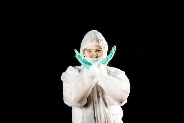 Doctor with protective suit and gloves