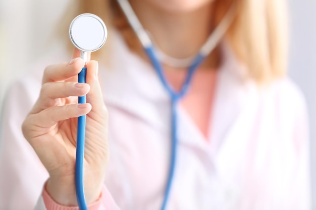 Doctor with stethoscope closeup