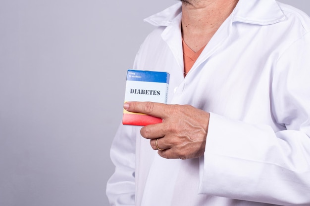 Doctor with stethoscope on his neck without showing his face