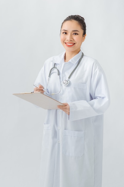 Doctor with a stethoscope, holding a notebook in his hand.