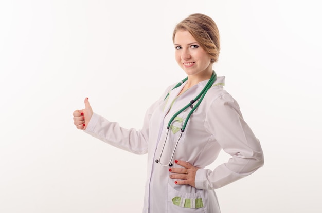 Doctor woman on white background showing thumb