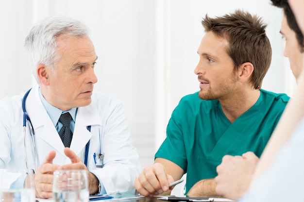 Doctors Discussing In Meeting