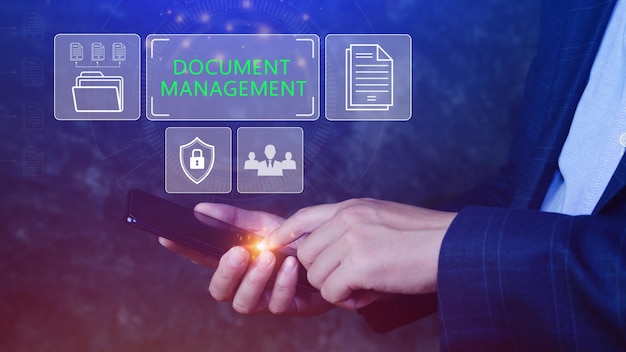 Document Management System DMS being setup IT consultant working on smartphone Software for archiving searching and managing corporate files information