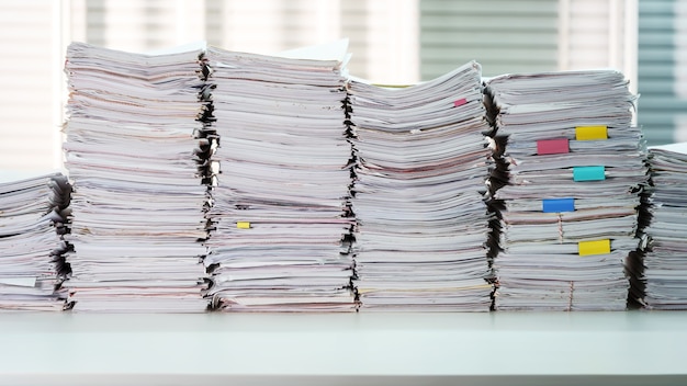 document stacked on working desk table at office room