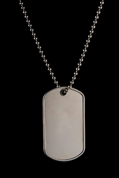 dog tag, military badge with chain and isolated on black background with space for text