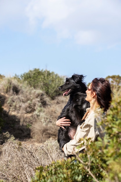 Dog trainer interacting with their pet