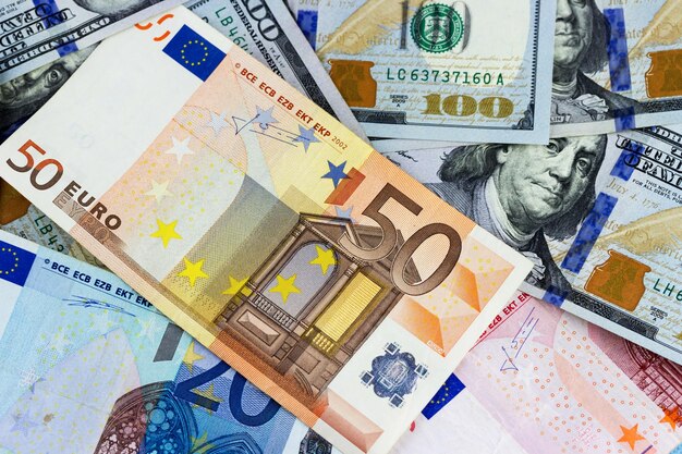 Dollar and euro banknotes as background