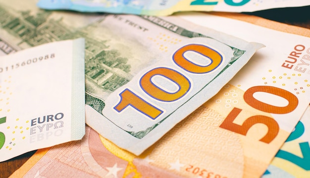 Dollar and euro banknotes on a table for exchange money concept