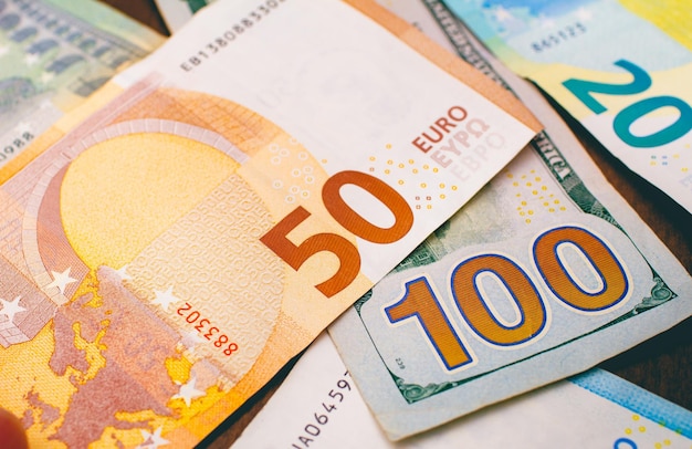 Dollar and euro banknotes on a table for exchange money concept