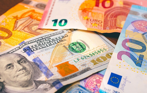 Dollar and euro banknotes on a table for exchange money concept