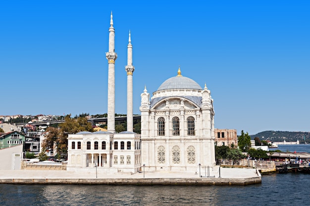 The Dolmabahce Mosque is in Istanbul, Turkey. It was commissioned by queen mother Bezmi Alem Valide Sultan.