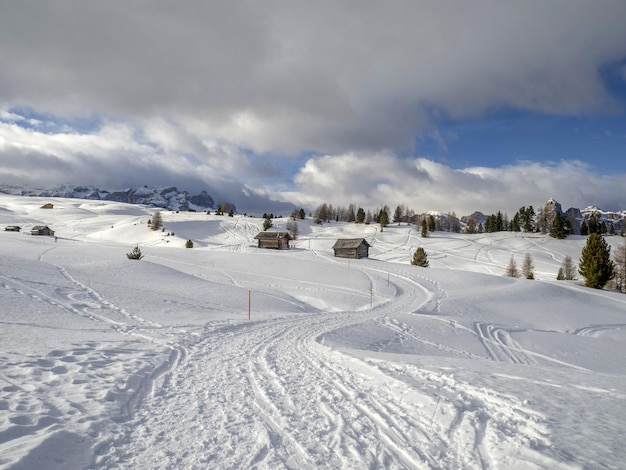 Dolomites snow panorama wooden hut val badia armentarola