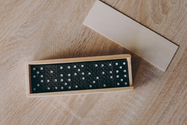 Dominoes in a wooden box a game for two