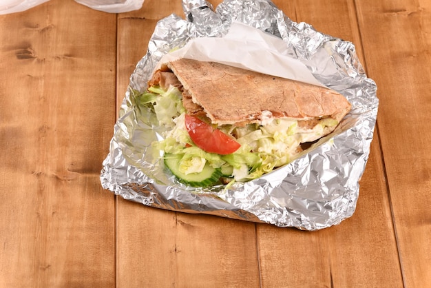 Doner kebab on aluminum foil