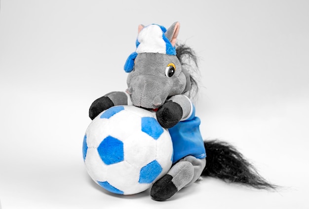 A donkey toy with a ball