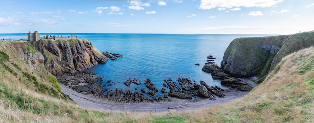 Donnottarr Castle in Scotland on the North Sea coast beautiful landscape