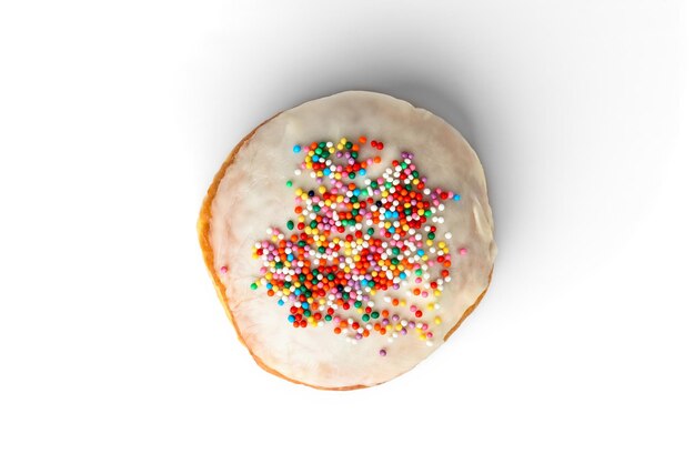 Donut with milk glaze isolated on white background.