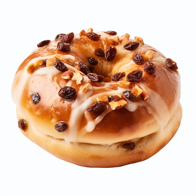 a donut with nuts on it sits on a table