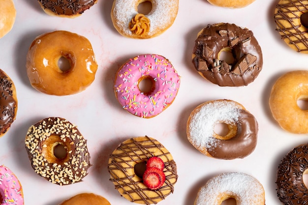 Donuts on marble surface Top view