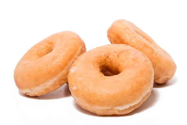 Donuts over white background