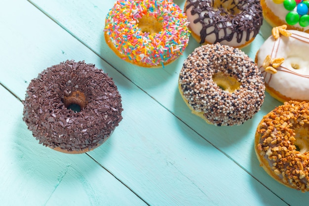 Donuts on wooden background