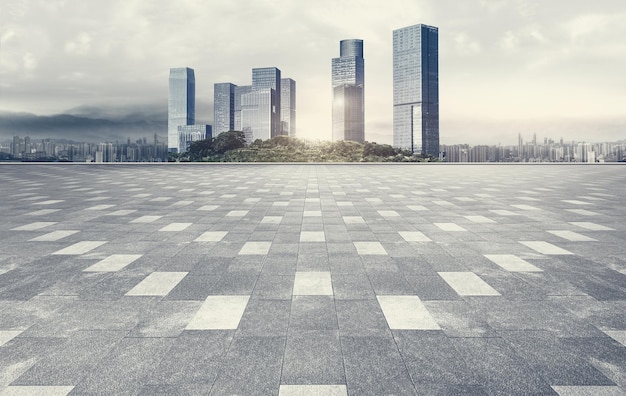 Doomsday atmosphere empty brick floor plaza with panoramic city skyline and skyscraper buildings