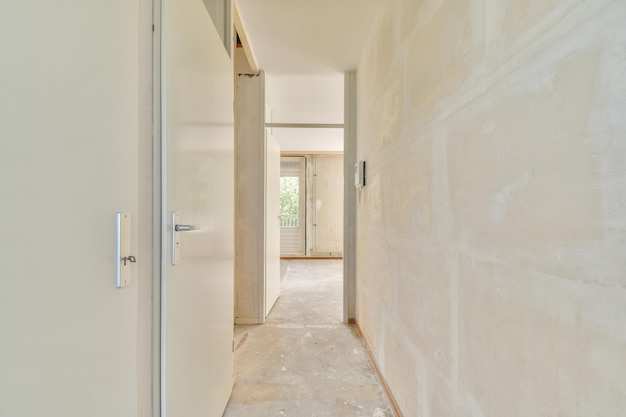 Doorway of modern apartment with white walls