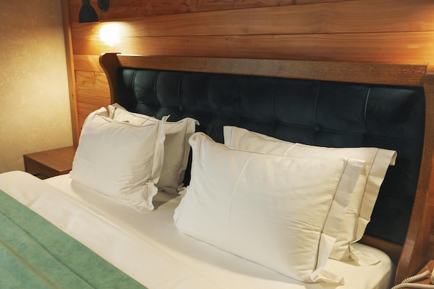 Double bed in apartments of cozy hotel