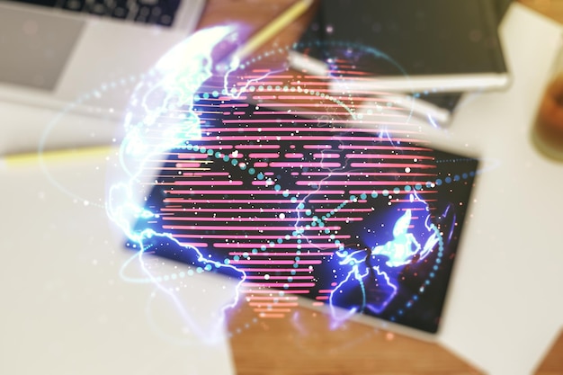 Photo double exposure of abstract digital world map with connections and modern digital tablet on background big data and blockchain concept