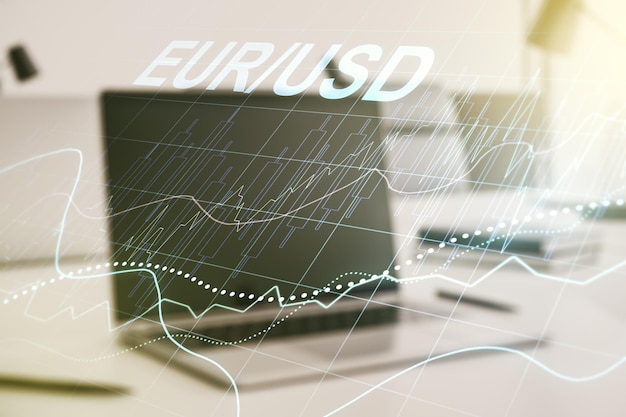 Double exposure of creative EURO USD forex chart hologram on laptop background Banking and investing concept