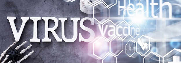 Double exposure. Medical background. Coronavirus wooden letters. Background of the deadliest pandemic virus in the world. Vaccine for the virus.